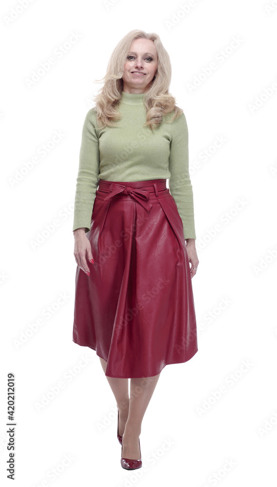young woman in a fashionable outfit striding forward. young woman in a fashionable outfit striding forward.