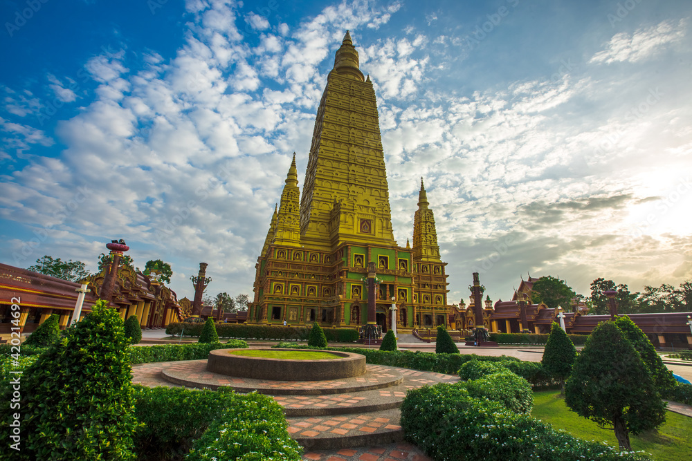 Fototapeta premium The beautiful sculpture background of, Wat Bang Thong, surrounded by trees, has a large area, is a religious tourist attraction in Krabi, with tourists always visiting, Thailand