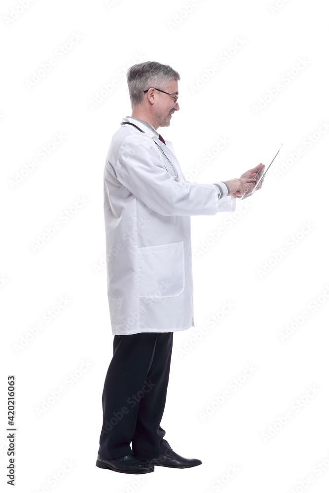 smiling doctor with a digital tablet . isolated on a white smiling doctor with a digital tablet . isolated on a white