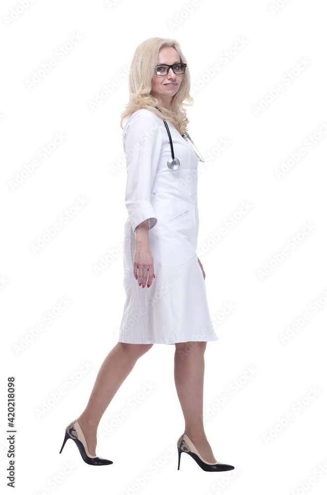 confident woman doctor striding forward. isolated on a white confident woman doctor striding forward. isolated on a white