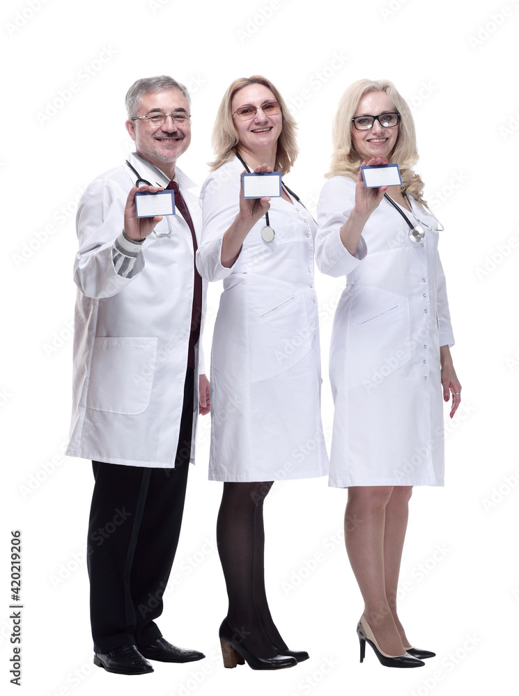 group of medical colleagues showing showing their visiting card. group of medical colleagues showing showing their visiting card.