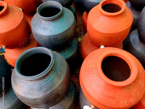 Obraz na plátně A clay water pot earthen pot with tap for water storage Clay pots not only cool the water down, they also provide healing with the elements of earth