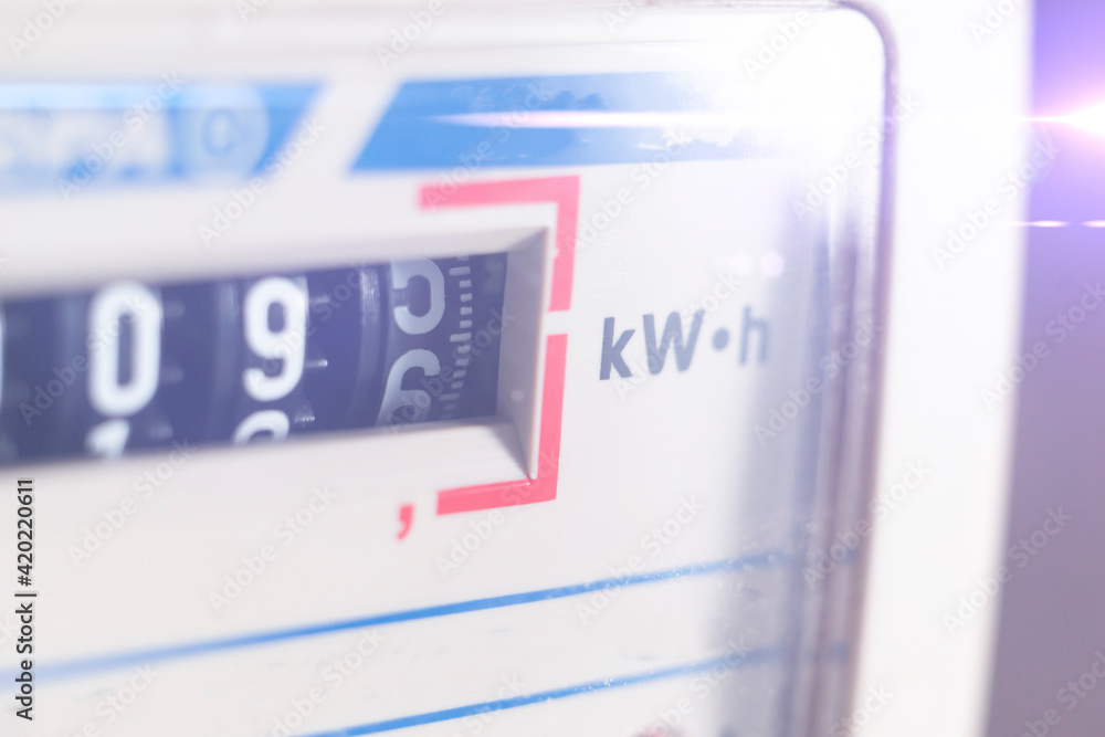 macro view of electricity watt meter, kilowatt calculator counter at home,  savings economy foto de Stock | Adobe Stock