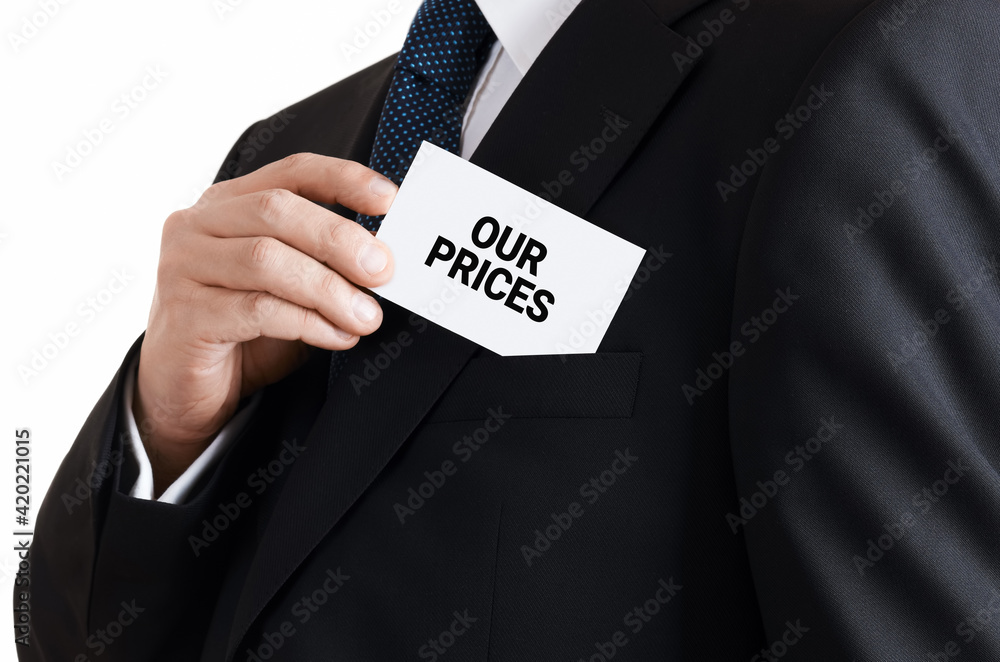 Businessman takes out a business card from his pocket with the message our prices. Business service price offer Businessman takes out a business card from his pocket with the message our prices. Business service price offer