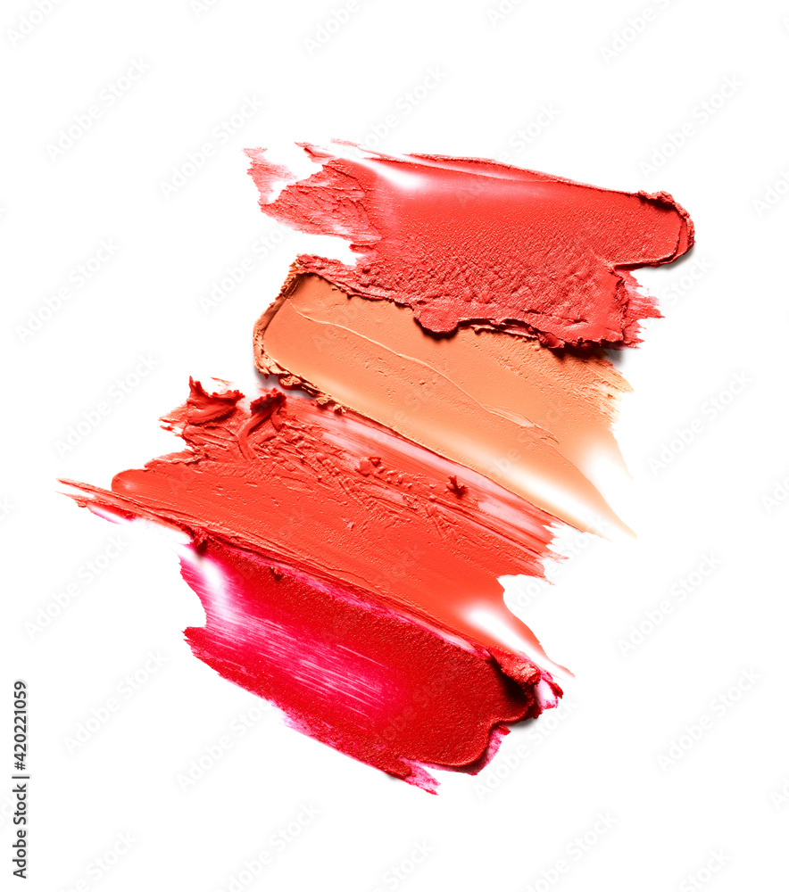 Smudged lipsticks isolated on white background Smudged lipsticks isolated on white background