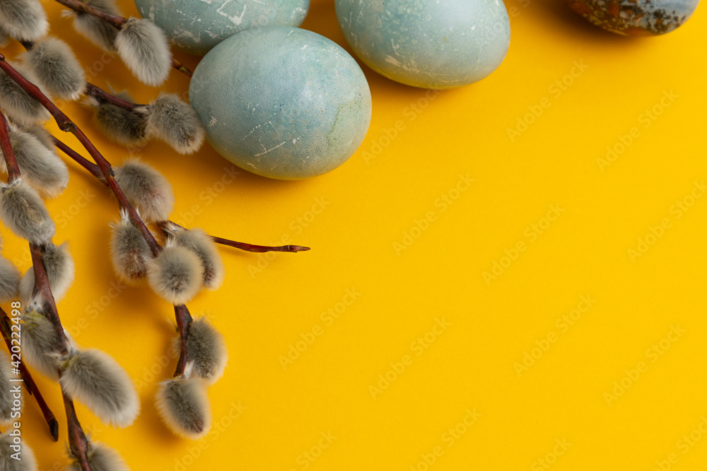 Happy Easter eggs on yellow bacground
