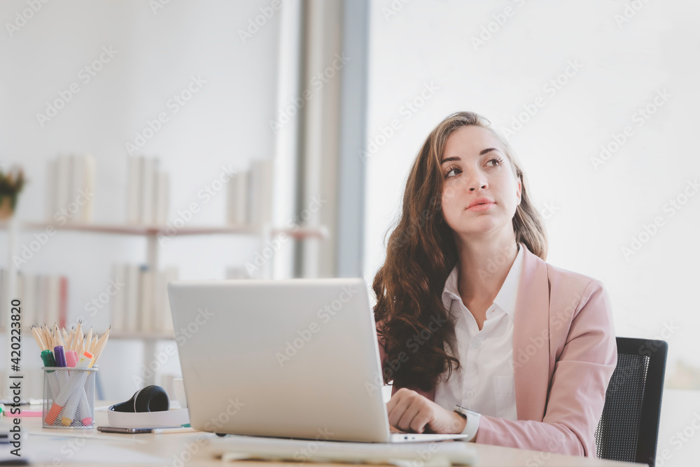 Working online mobility concept, Smiling caucasian woman working with computer laptop on white background with copy space Working online mobility concept, Smiling caucasian woman working with computer laptop on white background with copy space
