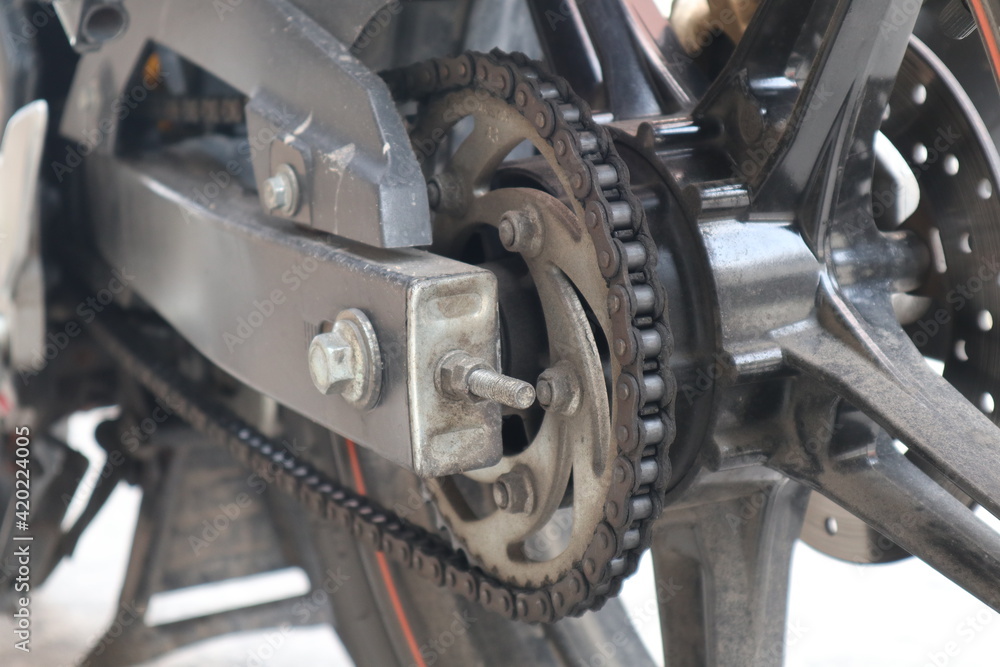 macro photo close up of a wheel chain motorcycle 500cc