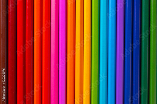 a range of colored pencils in all colors of the rainbow