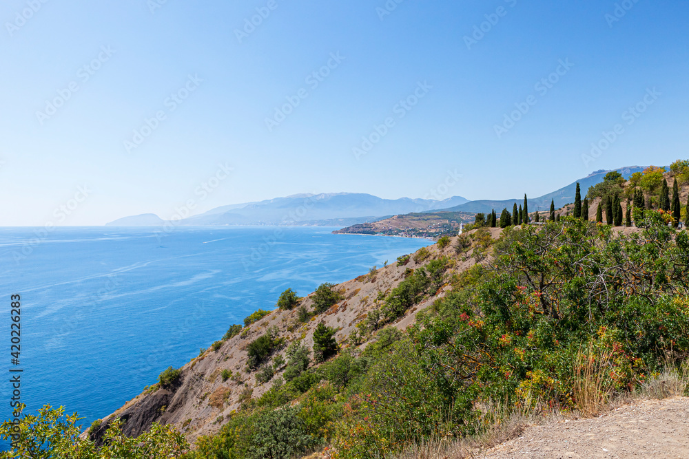 Fototapeta premium The sea coast of the Crimean peninsula with a beautiful view, on a summer sunny day.