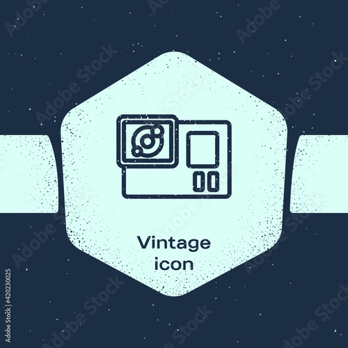 Grunge line Action extreme camera icon isolated on blue background. Video camera equipment for filming extreme sports. Monochrome vintage drawing. Vector