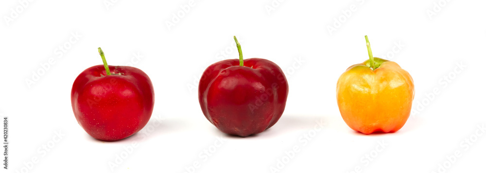 Acerola Cherry or Barbados Cherry with leaf isolated on white background. Acerola Cherry or Barbados Cherry with leaf isolated on white background.