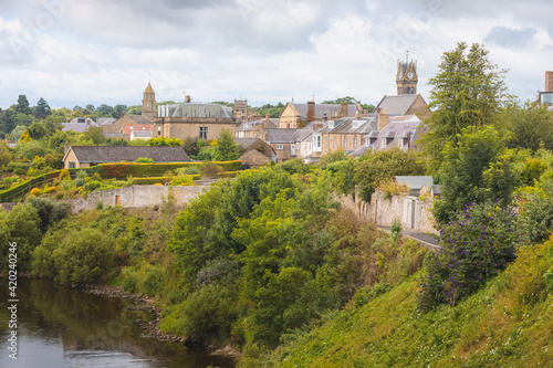 Townscape view of the historic quaint village of Coldstream along the River Tweed in the Scottish Borders, Berwickshire, Scotland, UK.