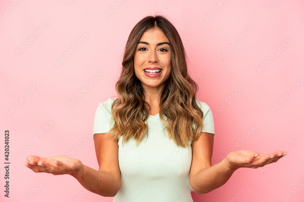 Young caucasian woman isolated showing a welcome expression. Young caucasian woman isolated showing a welcome expression.