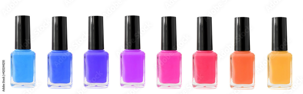 Group of bright nail polishes isolated on white background Group of bright nail polishes isolated on white background