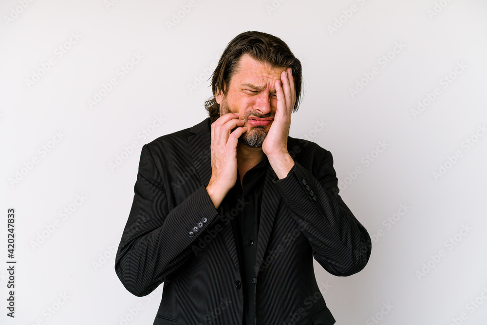 Middle age business dutch man isolated on white background whining and crying disconsolately. Middle age business dutch man isolated on white background whining and crying disconsolately.
