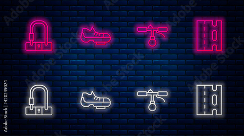 Set line Bicycle shoes, handlebar, lock and lane. Glowing neon icon on brick wall. Vector