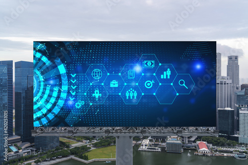 Research and development hologram on billboard over panorama city view of Singapore. The hub of new technologies to optimize business in Southeast Asia. Concept of exceeding opportunities.