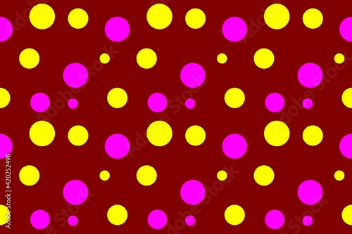 Yellow and pink circles of different sizes on a dark red background. Texture for textiles and paper