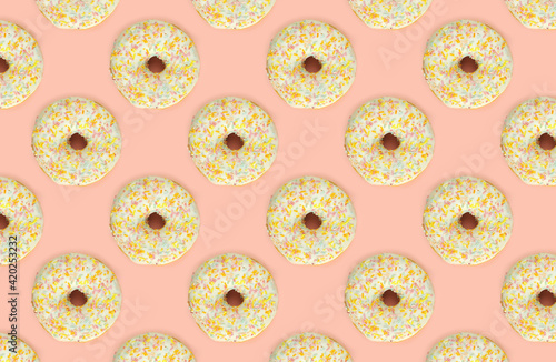 Ddelicious donuts on colorful background. National donuts day. Food pattern. photo