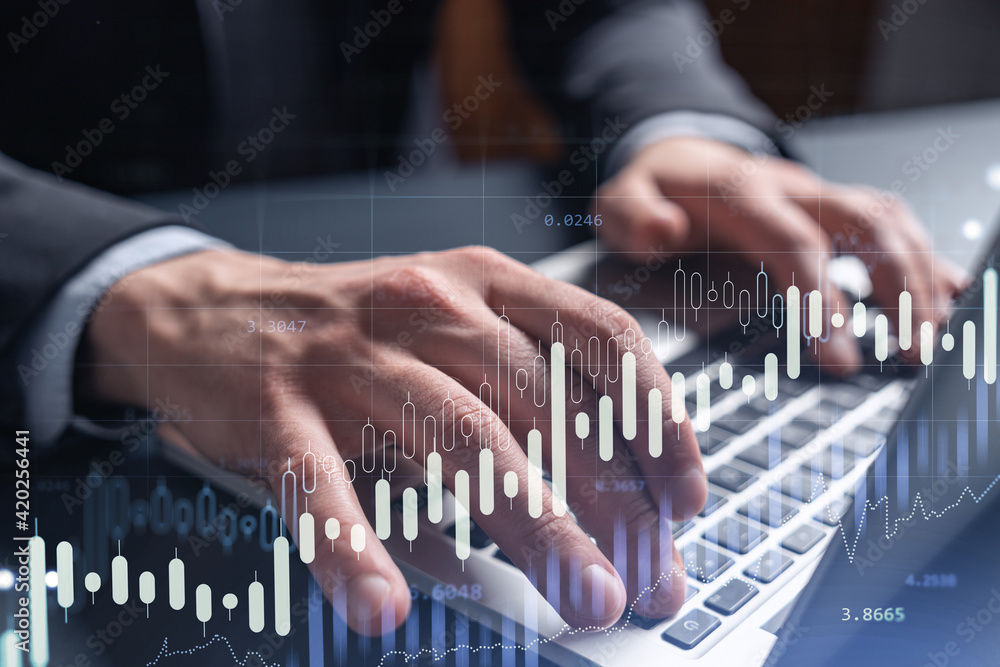 Hands typing the keyboard to research stock market to proceed right investment solutions. Internet trading and wealth management concept. Formal wear. Hologram Forex chart over close up shot. Hands typing the keyboard to research stock market to proceed right investment solutions. Internet trading and wealth management concept. Formal wear. Hologram Forex chart over close up shot.