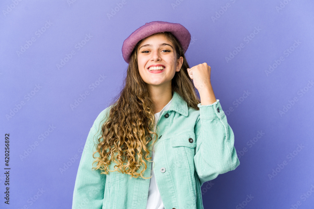 Young caucasian cute woman celebrating a victory, passion and enthusiasm, happy expression. Young caucasian cute woman celebrating a victory, passion and enthusiasm, happy expression.