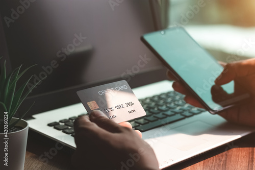 Tablou pe pânză Using smartphone for online shopping. Credit card internet pay.