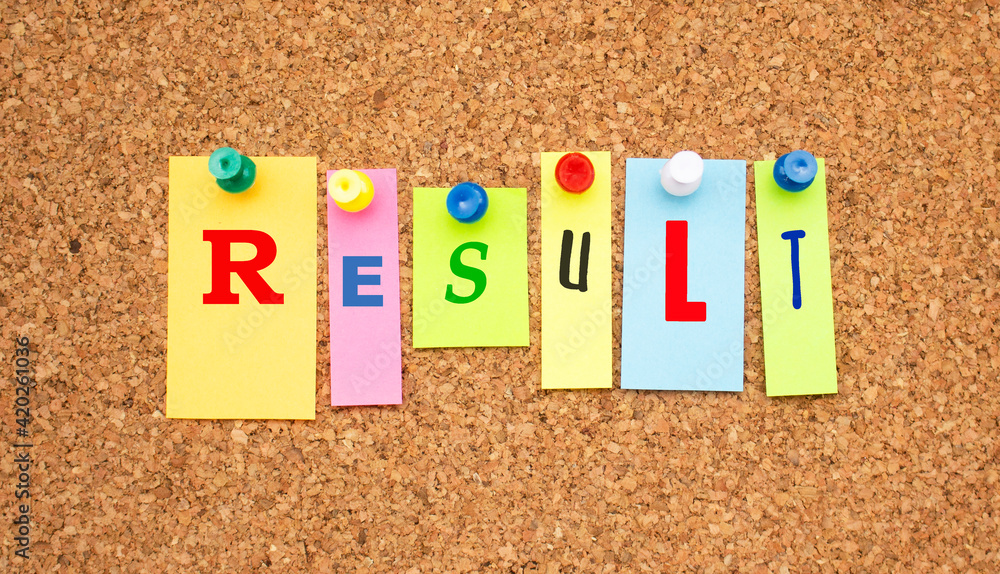 Color notes with letters pinned on a board. Word RESULT. Color notes with letters pinned on a board. Word RESULT.