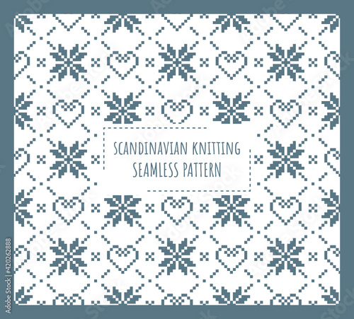 Scandinavian knitting seamless pattern design. Nordic star with heart pattern in white and blue.
