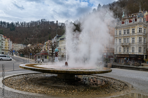 Thermal mineral water spring - Hot Spring (Vřídlo) in the center of spa town Karlovy Vary (Karlsbad) - Czech Republic