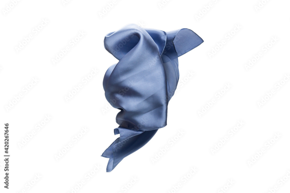 Flowing blue silk scarf isolated on white background.