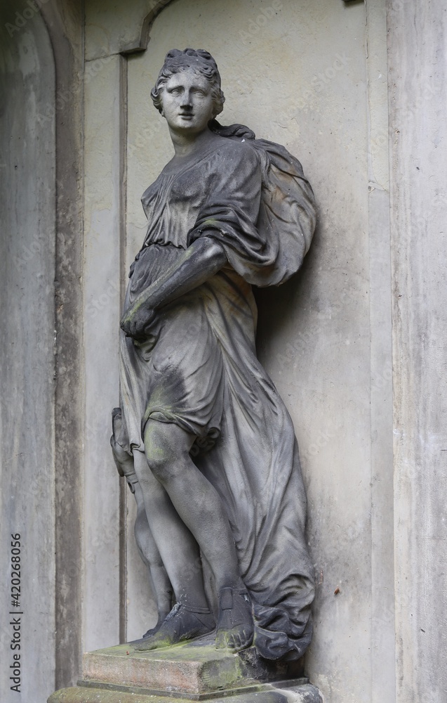 Classical Sculpture of a Woman in An Amsterdam Garden