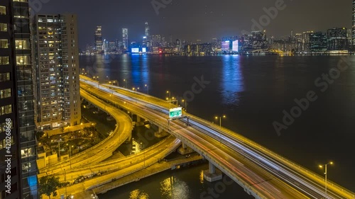 Car traffic at night on Island Eastern Corridor which is an expressway built along the northeastern shore of Hong Kong Island