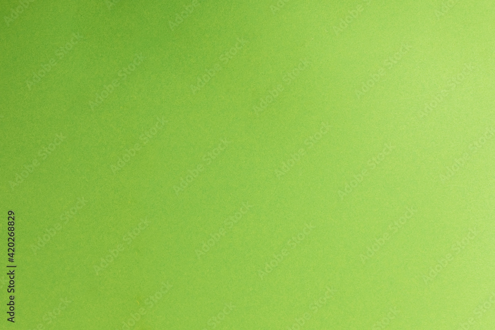 Green paper background saturated color with gradient lighting. For decor or design. A place for text Green paper background saturated color with gradient lighting. For decor or design. A place for text
