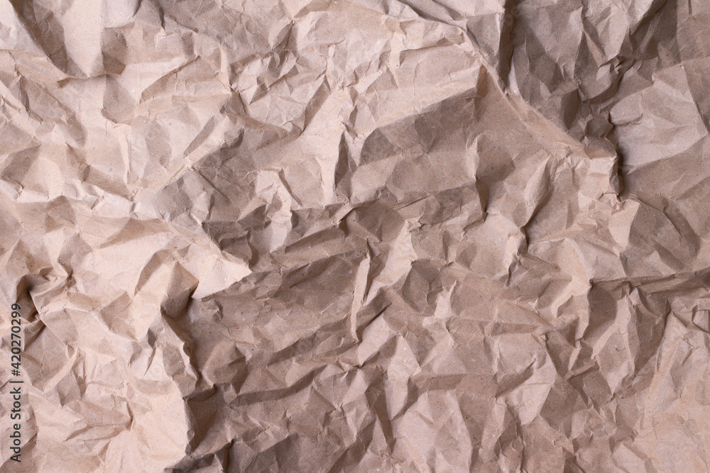 Fototapeta premium Beige kraft paper background. Horizontal orientation. 