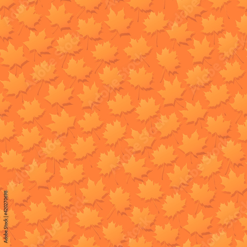 Seamless orange background with autumn maple leaves with shadows on flat.