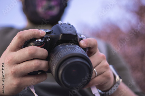 woman hand with photo camera