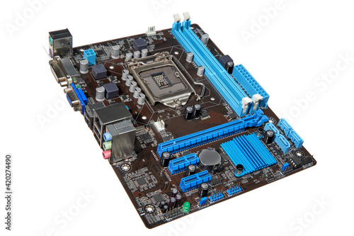The motherboard is placed diagonally against a white background. photo