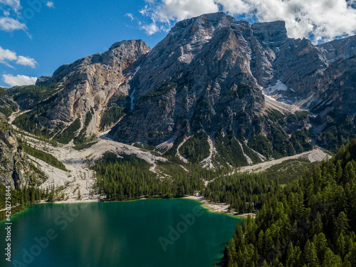 Aerial view of the Lake Braies, Pragser Wildsee is a lake in the Prags Dolomites in South Tyrol, Italy. View of Croda del Becco mountain in the background