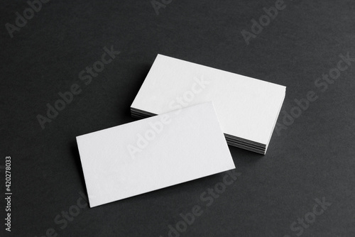 Business cards blank. Mockup on black background. Copy space for text. © yu_tsai