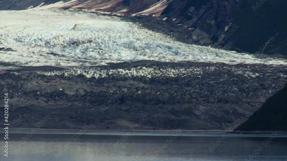 Glacier covered by volcanic ash in Glacier Bay National Park and Preserve, Alaska. Glacier covered by volcanic ash in Glacier Bay National Park and Preserve, Alaska.