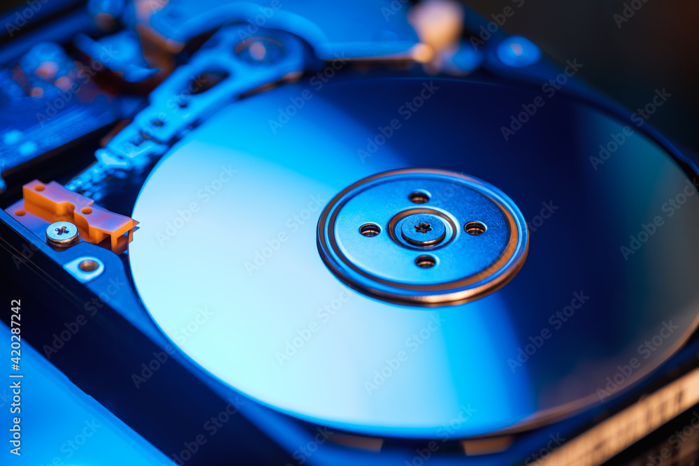 Disassembled hard drive from the computer. Computer HDD Hard Disk Drive. Computer Storage Memory Disassembled hard drive from the computer. Computer HDD Hard Disk Drive. Computer Storage Memory