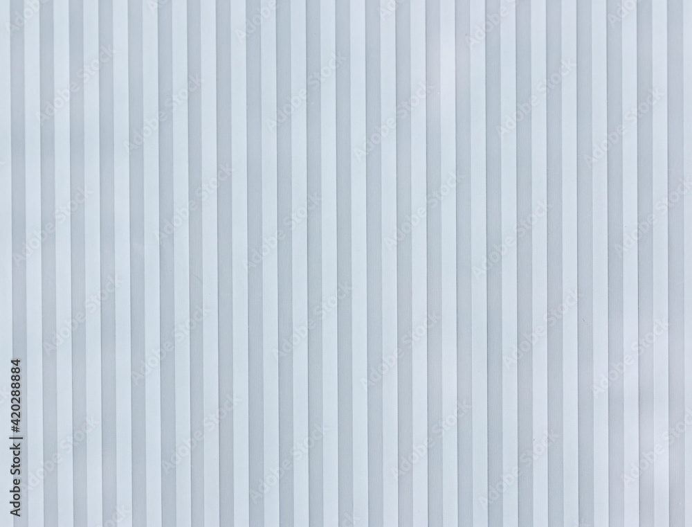 a white background with alternating light and dark stripes a white background with alternating light and dark stripes