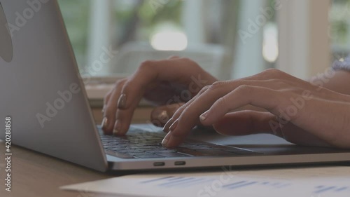 Presses on a keyboard, During the virus outbreak situation or social distance, Use laptop.