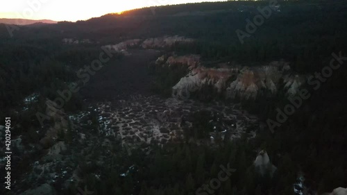 Flying over Malakoff Diggins State Historic Park in California at sunset photo