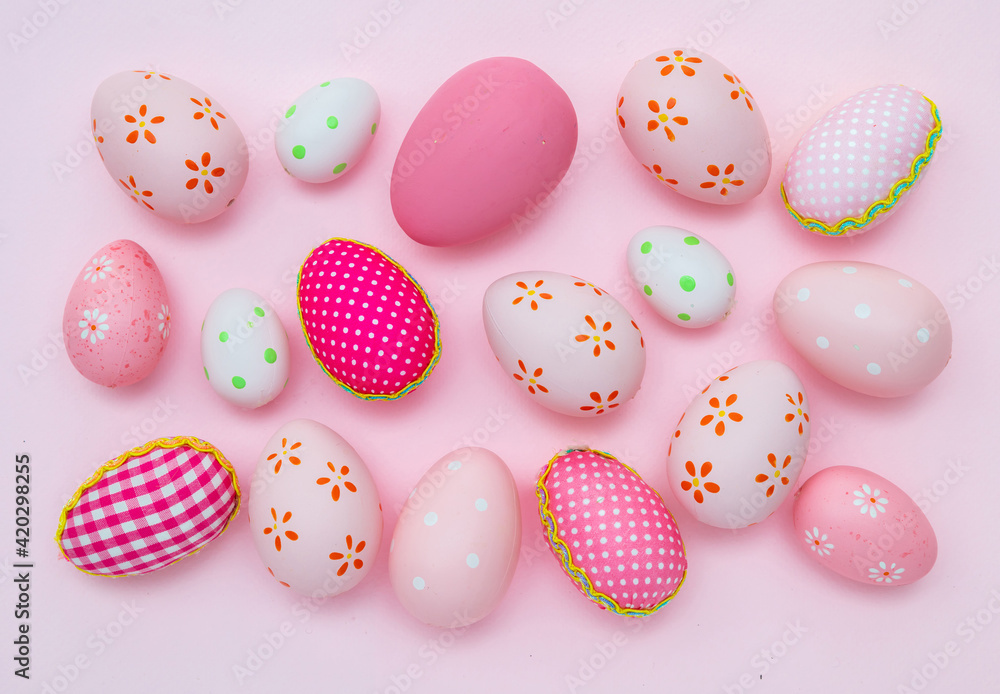 Happy Easter. Pink pastel color eggs variety on pink background Happy Easter. Pink pastel color eggs variety on pink background