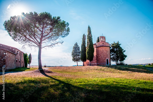 Obraz na płótnie Magic landscape with chapel of Madonna di Vitaleta on a sunny day in San Quirico d'Orcia (Val d'Orcia) in Tuscany, Italy. Excellent tourist places. w salonie