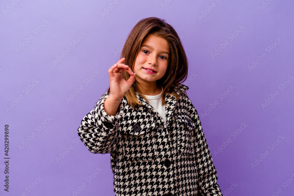 Little caucasian girl isolated on purple background Little caucasian girl isolated on purple background cheerful and confident showing ok gesture. Little caucasian girl isolated on purple background Little caucasian girl isolated on purple background cheerful and confident showing ok gesture.