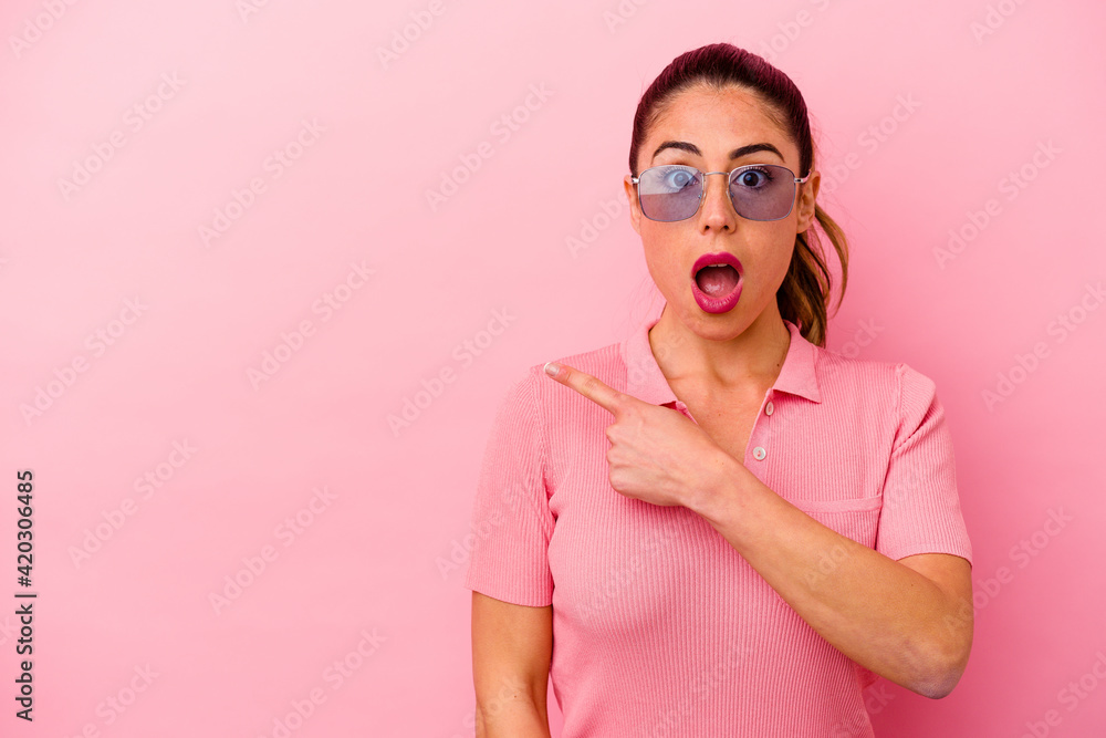 Young caucasian woman isolated on pink background Young caucasian woman isolated on pink background