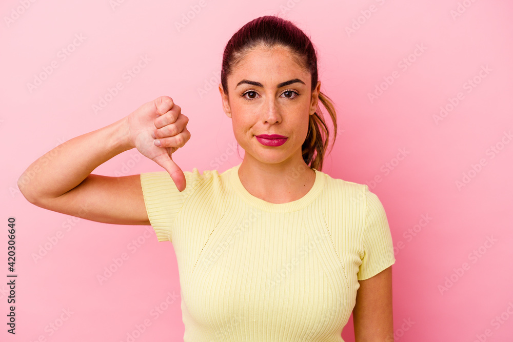 Young caucasian woman isolated on pink background Young caucasian woman isolated on pink background